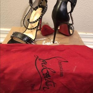 Worn once, Louboutins choca cross spike sandal- 38